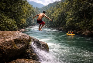 A cliff jump into a jungle river with rafts below